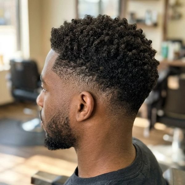 5. Mid taper with coily or afro-textured hair